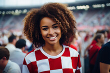A Young Woman In A White And Red Checkered Jersey, Cheering For Victory In A Sports Competition. Diverse Team Spirit. Generative Ai Image