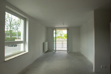 Poster - Empty unfinished room with window in a new constructed building