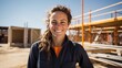 Portrait of happy female architect at construction site ,