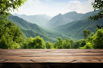 Wall Mural - Wooden table on the mountain with green nature background