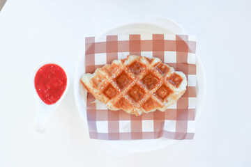 Wall Mural - croffle or waffle or croissant , French croissant or French bread with sugar