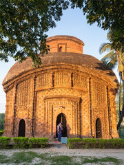 Wall Mural - Vertical font view of ancient Chachra Shiva temple aka Shiv mandir at sunset, Jessore, Bangladesh