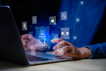 Ai technology analysis, hand point to AI icon network. AI technology Machine learning for data analysis and management, Data analysis using artificial intelligence is essential. Futuristic technology.