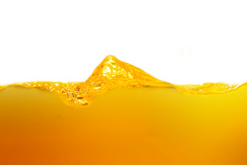 Poster - Close up bright orange juice texture for health and nature waves