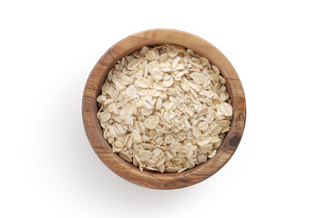 Wall Mural - A top view of oat flakes in a wood bowl on white background