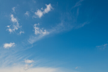 Wall Mural - White clouds in the blue sky