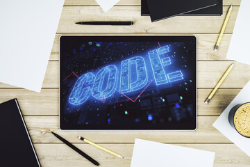 Wall Mural - creative code word sign on modern digital tablet display, international software development concept