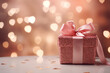 Cozy composition with shiny gift box and pink bow ribbon against bokeh lights background. Valentine day or birthday fashion card.