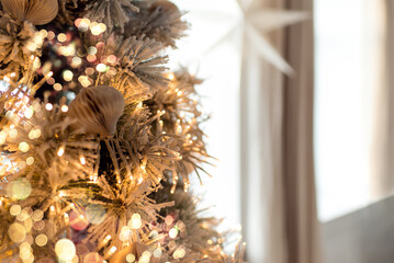 Wall Mural - christmas tree branches with decorations, balls, garlands, bokeh. postcard with space for text. merr
