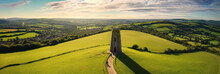 Aerial View Of Glastonbury Tor Near Glastonbury In The English County Of Somerset, Topped By The Roofless St Michael's Tower, UK. Ai Generative.