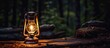A glowing kerosene lamp rests on an outdoor stump at night.