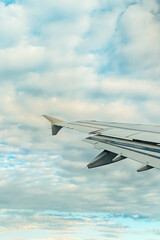 Canvas Print - Wing of an airplane, view from window.