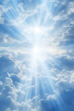 Bright Blue Sky With Sun Rays Shining Through Clouds