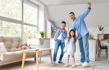 Canvas Print - Happy little children with their father at home