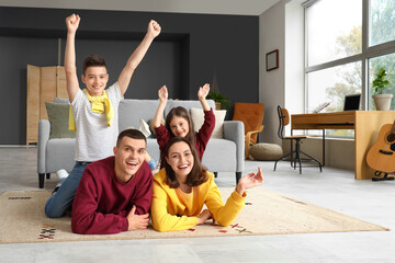 Canvas Print - Happy little children with their parents at home