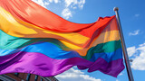 Fototapeta  - A Big  Rainbow Flag Waving In The Street