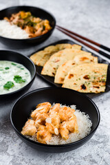 Wall Mural - Boiled rice with fried chicken fillet, vegetables and tuna shavings, kefir soup and flatbread.