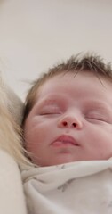 Poster - Peaceful, sleeping and newborn baby on a bed at a home in the bedroom for resting and dreaming. Cute, sweet and little infant, child or kid taking a nap in the morning in the nursery at family house.