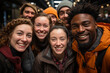© koala studio - multiethnic group of friends in winter clothes smiling at camera in city
