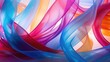 A closeup shot of two long pieces of ribbon, their vibrant colors twirling and intertwining in a playful tangle of abstract patterns.