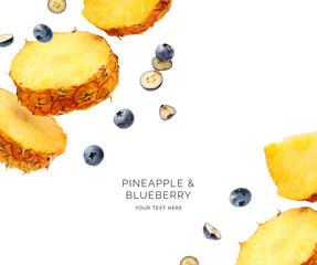 Wall Mural - Creative layout made of pineapple and blueberry on the white background. Flat lay. Food concept. Macro concept.	
