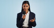 Woman, portrait or presenter in studio talking, speaking on talk show or media on blue background. Breaking news, tv press or Indian reporter presenting live global political events with microphone
