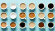 Many different cups with aromatic coffee on light blue table, 