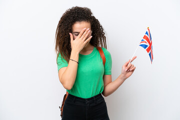 Wall Mural - Young Arab woman holding an United Kingdom flag isolated on white background with tired and sick expression