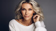 © 0livia - Studio portrait of beautiful natural middle aged woman. Smiling positive portrait of stylish blonde lady. AI generated.