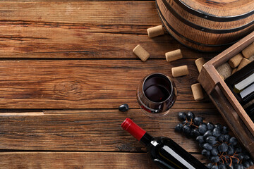 Canvas Print - Winemaking. Flat lay composition with tasty wine and barrel on wooden table, space for text