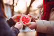 Lovers give valentines from hand to hand on Valentine's Day, February 14