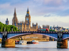 View Over The River Thames Towards The Palace Of Westminster At Sunrise, London, England, United Kingdom