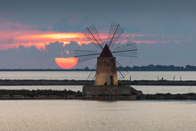 Italy, Sicily, Trapani, Marsala, A Windmill On The Salt Pans