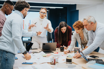 Group of professionals collaborating on business strategies and discussing market analysis and financial planning for corporate success.