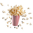 Popcorn in a traditional cardboard box or bucket, with pieces flying, floating in the air