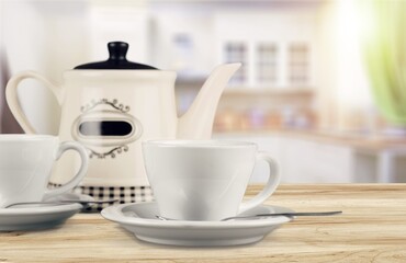 Poster - Hot tasty tea in cup and teapot