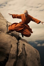 Shaolin Warrior Monk Practicing Extreme Kung Fu Jumping In Mountains