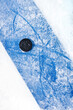 Looking down on an ice hockey puck at the blue line