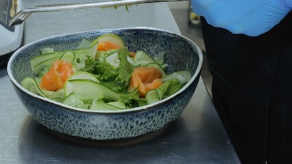 Wall Mural - Vegetable salad on a plate, vegetarian food. Vegetable salad with sunflower oil, close-up