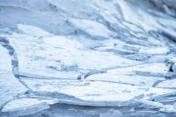 Wall Mural - Broken ice shards lay on the coast of Baltic Sea