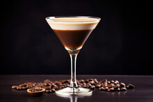 A glass containing a coffee-infused cocktail, elegantly displayed against a dark, sultry backdrop, beckoning you to indulge in its decadent flavors