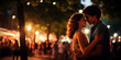Young couple kissing on the street in the evening at the night.