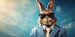 Stylish and cool hare or rabbit in a business suit on a blue background. 