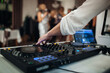 © UnPinky - DJ equipment control close-up during a disco