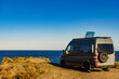 Caravan van camping on coast sea shore