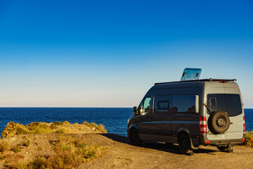 Canvas Print - Caravan van camping on coast sea shore