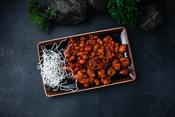 Wall Mural - Pork with sweet peppers and onions in garlic chili sauce, Asian food.