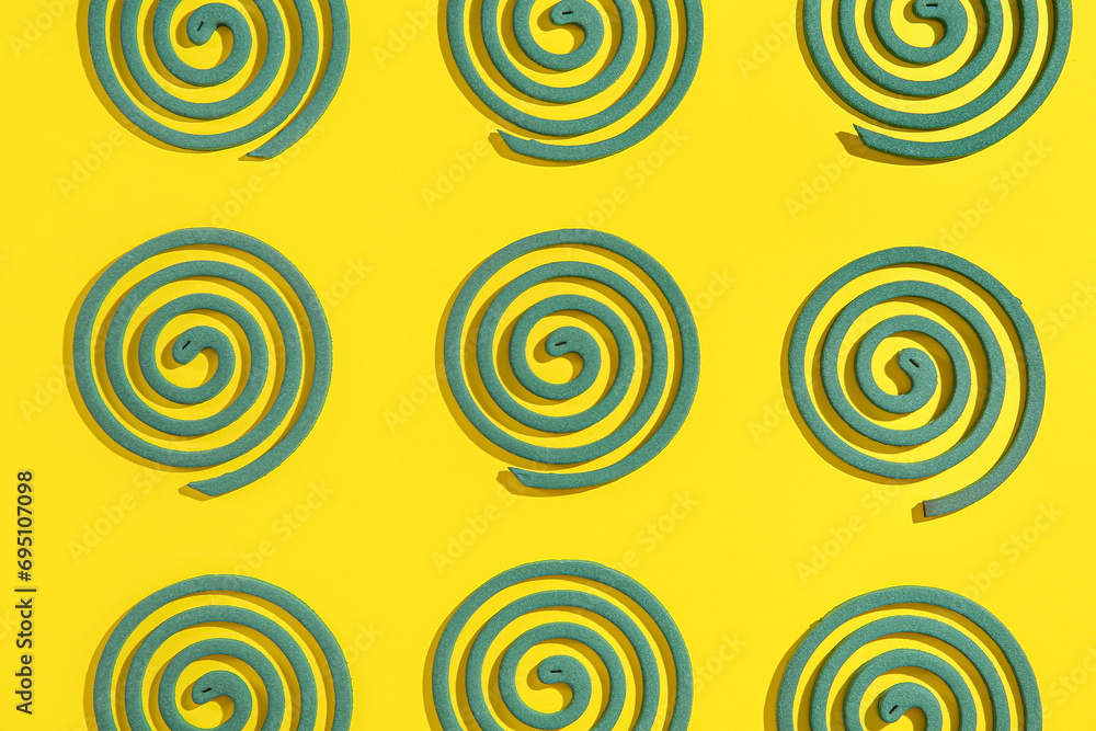 Mosquito spirals on yellow background