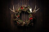 Fototapeta  - Wreath with fir tree branches, flowers and antler hanging on wooden wall. Outdoor decorations. Pagan Christmas, New Year, Yule. Ethnic decor. Mystical design for Halloween card, poster, banner