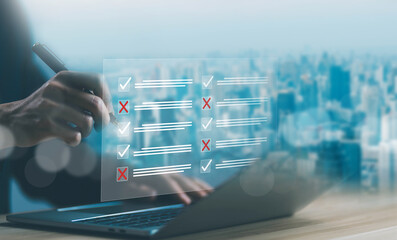 person ticks the checkmark in the box on the laptop. checklist process order on the list of documents. concept audit, check form online, business verify task detail and evaluation tick mark